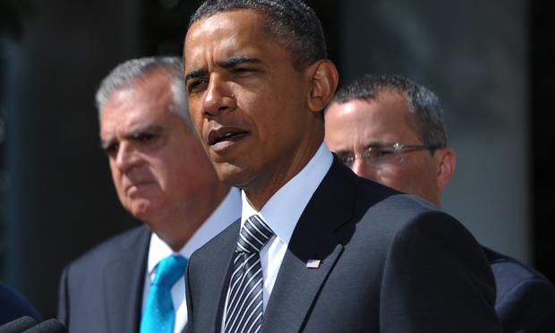 President Obama, flanked by DOT head Ray LaHood and US Chamber of Commerce COO David Chavern.