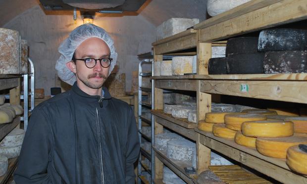 Michael Anderson in a cheese cave. Michael Anderson in a cheese cave.