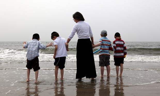 Mother with her children at Coney Island on Friday before Memorial Day.
