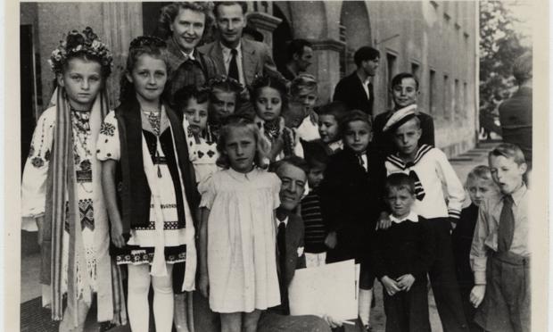 Group portrait of young children, many in national garb, who await repatriation from Berlin to the U.S. zone, 1948.