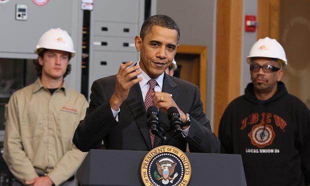 U.S. President Barack Obama speaks about creating new energy jobs during a visit to the jobs training center at the International Brotherhood of Electrical Workers Local 26 headquarters on February 16