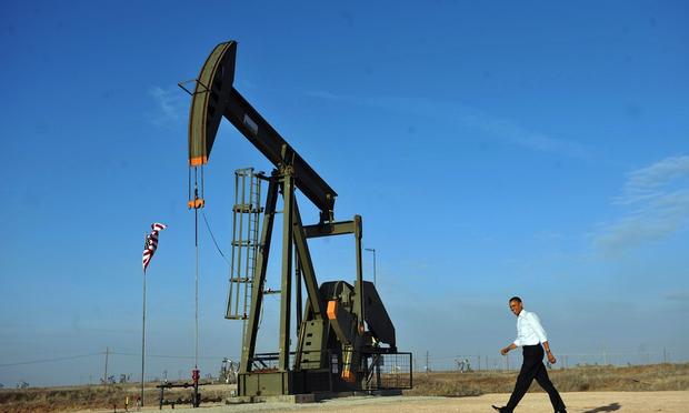 Barack Obama walks past an oil rig to a stage to speaks at an oil and gas production fields on federal lands March 21, 2012 near Maljamar, NM. Barack Obama walks past an oil rig to a stage to speaks at an oil and gas production fields on federal lands March 21, 2012 near Maljamar, NM.