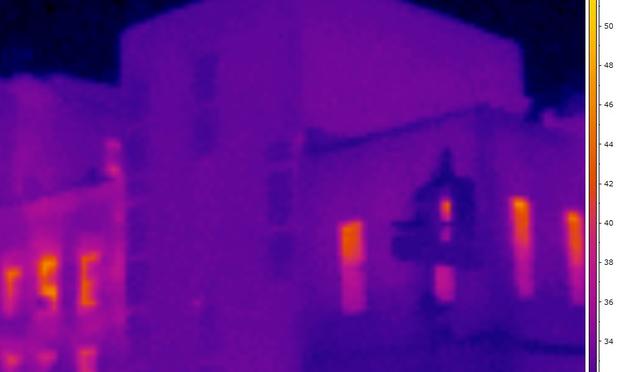 An infrared camera shows how little heat escapes the walls of the new building on Grand Street An infrared camera shows how little heat escapes the walls of the new building on Grand Street