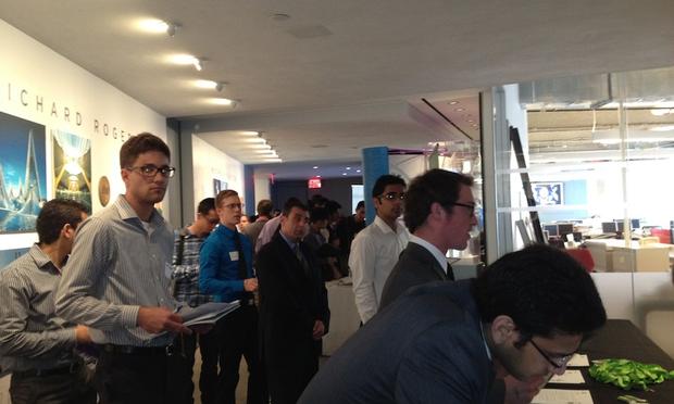Jobseekers line up to speak with recruiters from Spotify at the third annual NYC Startup Job Fair.