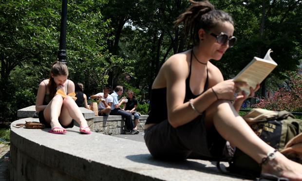 Reading in the sun on a lunch break in Union Square Park.