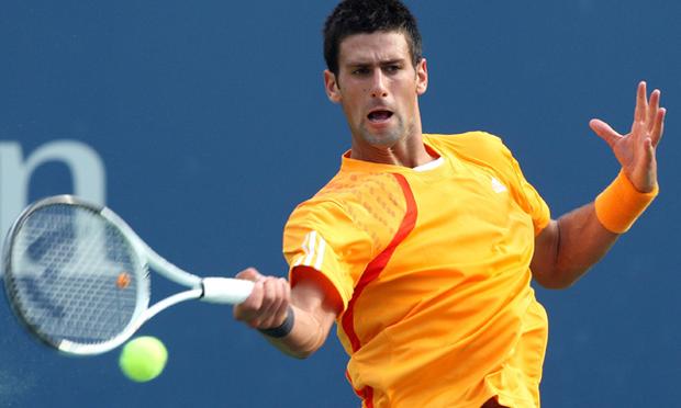 Novak Djokovic returns a shot against Fernando Verdasco. 58272003