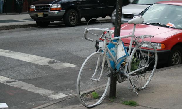 Ghost Bikes are small memorials for bicyclists who are killed or hit on the street. A bicycle is painted all white and locked to a street sign near the crash site, accompanied by a small plaque. Ghost Bikes are small memorials for bicyclists who are killed or hit on the street. A bicycle is painted all white and locked to a street sign near the crash site, accompanied by a small plaque.