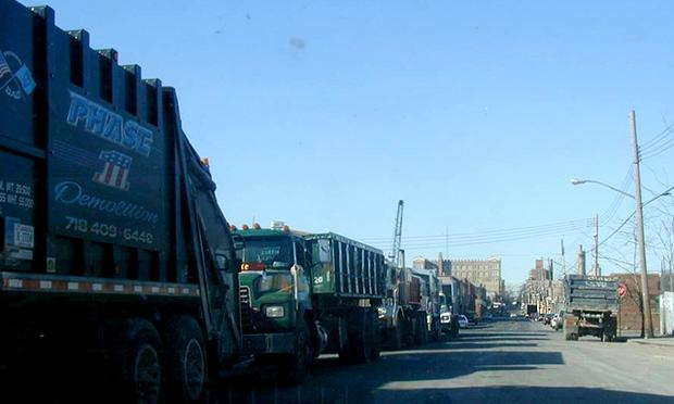 In the South Bronx, trucks queue up to enter one of approximately 15 garbage transfer sites. Photo: Ramon Cruz. In the South Bronx, trucks queue up to enter one of approximately 15 garbage transfer sites. Photo: Ramon Cruz.