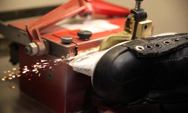 Sparks fly as the skates get sharpened.