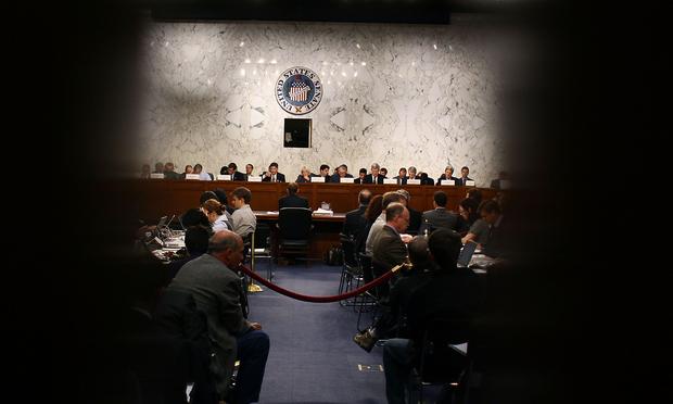 Members of the Joint Deficit Reduction Committee participate in a hearing October 26, 2011