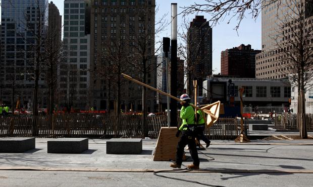 Workers are planting trees and putting in benches at the 9/11 Memorial Workers are planting trees and putting in benches at the 9/11 Memorial, World Trade Center,
