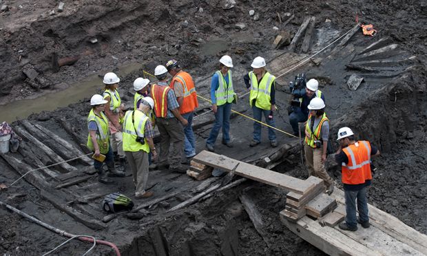 Workers and members of the media inspect the hull of a late 18th or early 19th century ship found at the World Trade Center site Workers and members of the media inspect the hull of a late 18th or early 19th century ship found at the World Trade Center site