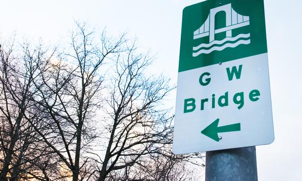 A sign directing New Jersey traffic toward the George Washington bridge. A sign directing New Jersey traffic toward the George Washington bridge.