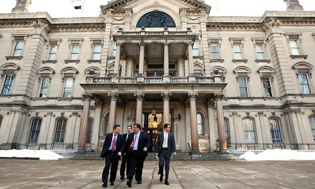 Gov. Christie walks with Bill Stepien, his former campaign manager.
