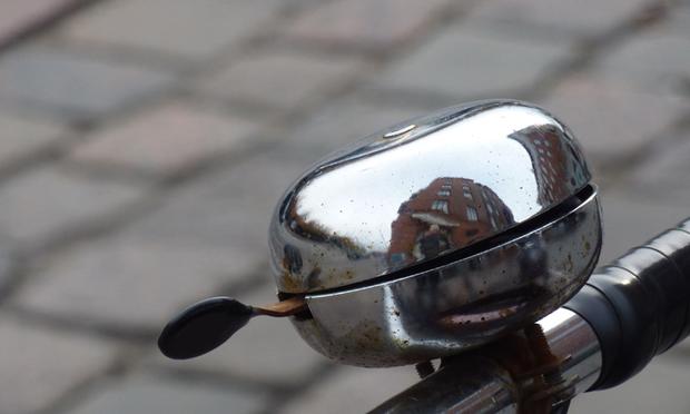 Lucy always knows her best friend is passing her window when she hears a bike bell.