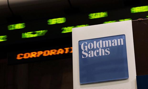 Stock prices whiz by on a ticker near the Goldman Sachs booth on the floor of the New York Stock Exchange April 16, 2010 in New York, New York.