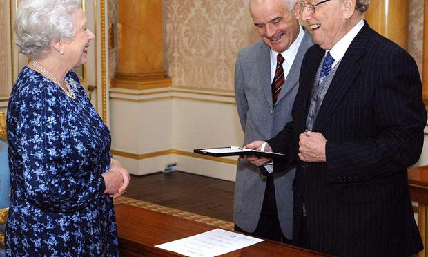 Britain's Queen Elizabeth II (L) presents the inaugural Queen's Medal For Music to Australian musician Sir Charles Mackerras (R) at Buckingham Palace in London.