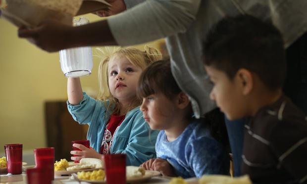 Children eat at a federally-funded Head Start Program school, 09/20/12 in Woodbourne, NY. The school provides early education, nutrition & health services to children from low-income families.