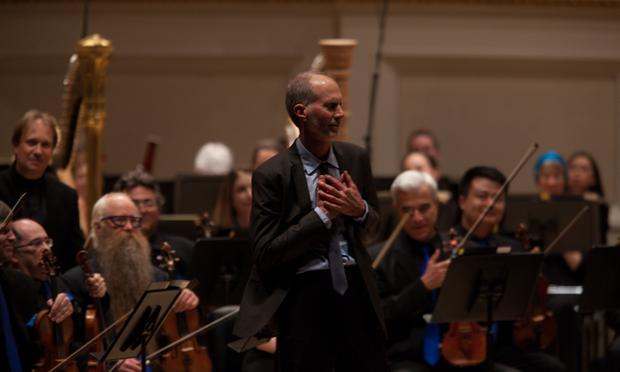 The composer John Luther Adams, whose music is often inspired by the natural world, accepts the enthusiastic applause from the Carnegie Hall audience