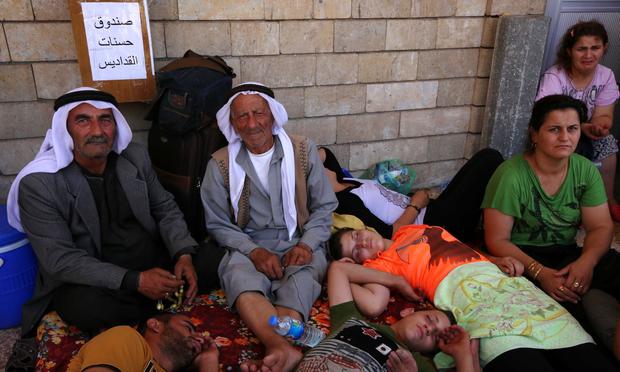Iraqi Christians who fled the violence in the village of Qaraqush, about 30 kilometres east of the northern province of Nineveh.