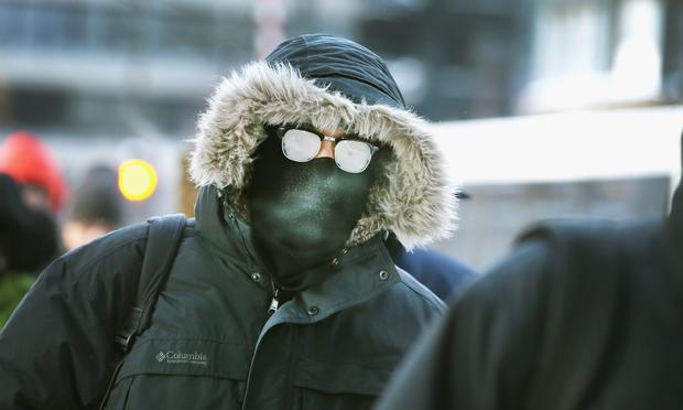 Commuters make a sub-zero trek to offices in the Loop on January 6, 2014 in Chicago, Illinois. Temperatures in the city dipped to -16 degree Fahrenheit this morning on the heals of a polar vortex.