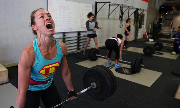 Lita Collins does a deadlift during a CrossFit workout at Ross Valley CrossFit on March 14, 2014 in San Anselmo, California.