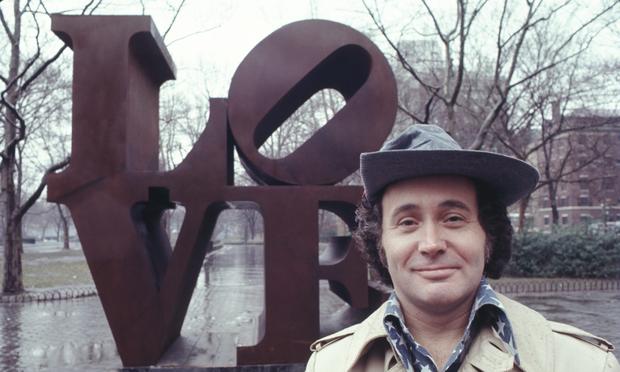 Robert Indiana with his 'LOVE' sculpture in Central Park, New York City in 1971.