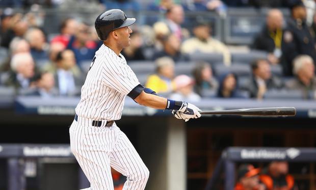 Derek Jeter of the New York Yankees hits a double against the Baltimore Orioles in the fifth inning during their game on April 7, 2014 at Yankee Stadium