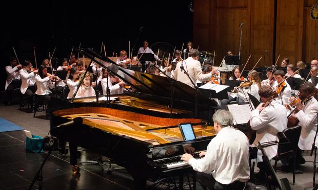 Christopher O'Riley and Anne-Marie McDermott perform with the National Repertory Orchestra. Christopher O'Riley and Anne-Marie McDermott perform with the National Repertory Orchestra.