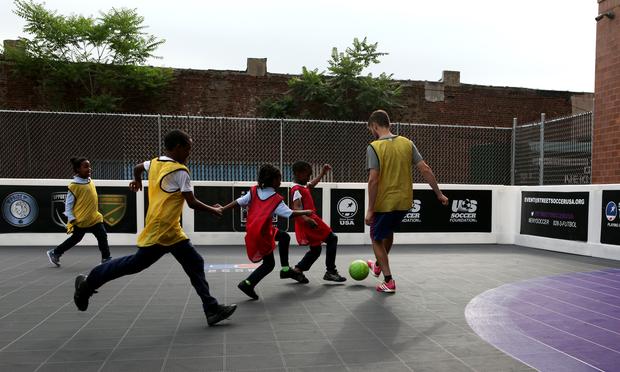 A scrimmage in East New York, led by the coaches at Street Soccer USA. A scrimmage in East New York, led by the coaches at Street Soccer USA.