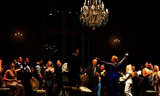 Party scene in La Traviata at Teatro alla Scala in Milan, Italy. Party scene in La Traviata at Teatro alla Scala in Milan, Italy.