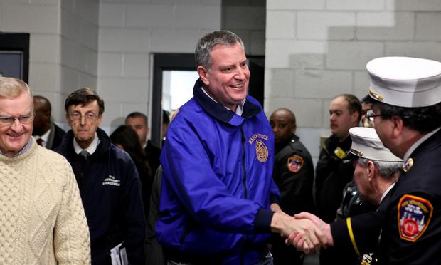 Mayor Bill de Blasio meets with EMT workers in Gowanus, Brooklyn and briefs the press on storm clean-up updates on January 22, 2014. Mayor Bill de Blasio meets with EMT workers in Gowanus, Brooklyn and briefs the press on storm clean-up updates on January 22, 2014.