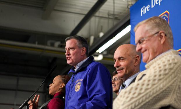 Mayor Bill de Blasio briefs the press on snow storm clean-up efforts with FDNY chief Salvatore Cassano (c) and Dept. of Sanitation head John Doherty (R). Mayor Bill de Blasio briefs the press on snow storm clean-up efforts with FDNY chief Salvatore Cassano (c) and Dept. of Sanitation head John Doherty (R).