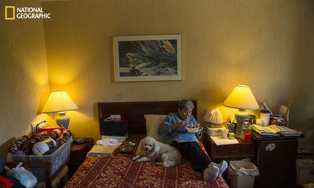 Rosemarie Patronella, 74, eats a lunch of ramen noodles and buttered rice in her room at a Ramada in Houston. Hunger among the elderly is particularly severe in Texas and has risen since 2007. hunger