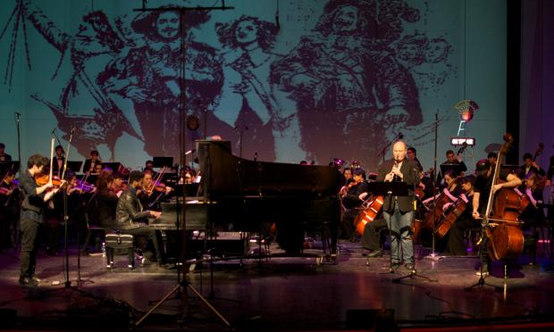 The Interlochen Arts Academy Orchestra performs a world premiere or 'Three Musketeers: A Play for Instruments.' The Interlochen Arts Academy Orchestra performs a world premiere or 'Three Musketeers: A Play for Instruments.'