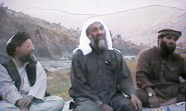 This frame grab from the Saudi-owned television network MBC (Middle East Broadcasting Center) shows alleged Al Qaida spokesman Suleiman Abu Ghaith sitting to the right of Osama bin Laden.