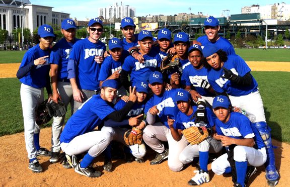David Garcia-Rosen, top right, poses with his 2013 International Community High School Baseball Team that he coaches through the Small Schools Athletic League.