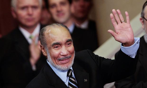 New York retired politician Basil Paterson, father of New York Gov. David Paterson, waves at his son's swearing-in ceremony March 17, 2008 in Albany.