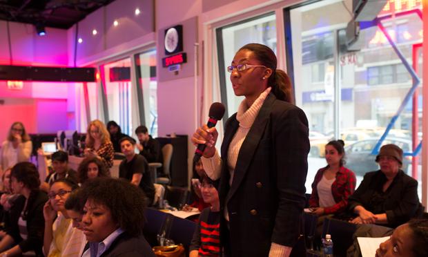 A high school student asks about honors programs in NYC schools at a WNYC live event Greene Space event
