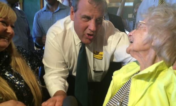 Gov. Christie greets 102-year-old Clemence Blanchard and her daughter, Summer Hebert, at T-Bones restaurant in Bedford, NH.