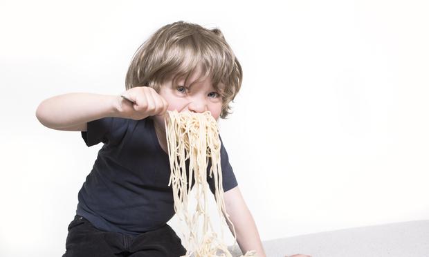 Don't let your kids ruin your love of good food. You can teach them to love good food, too. kid eating spaghetti kids food
