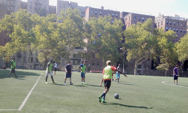 Unaccompanied children from Central America playing soccer at Mullaly Park in the South Bronx