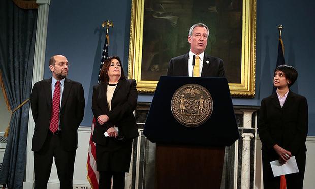 Mayor Bill de Blasio announcing the appointment of Steve Banks (left), Lorraine Grillo and Nisha Agarwal.