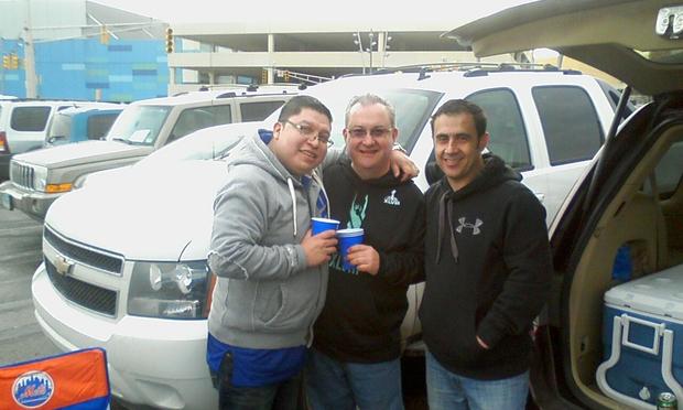 Dominick Arlistico, center, with two other dads in the Met Life Stadium parking lot during Super Bowl XLVIII.