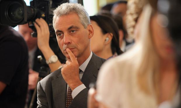 White House Chief of Staff Rahm Emanuel listens as U.S. President Barack Obama answers questions during a news conference in the East Room of the White House September 10, 2010 in Washington, DC.