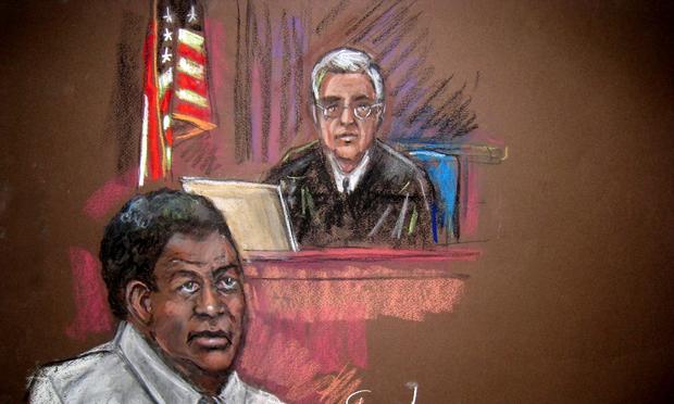 This courtroom drawing shows Tanzanian Ahmed Ghailani in court before Judge Lewis Kaplan on November 17, 2010 in New York. Ghailiani faces a minimum sentence of 20 years.