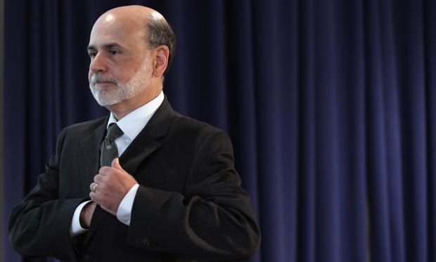 Federal Reserve Board Chairman Ben Bernanke walks away from the podiuim after delivering remarks September 15, 2011 in Washington, DC.