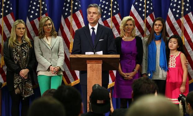 Former Utah Gov. Jon Huntsman flanked by his family.