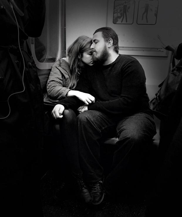 couple sitting together on MTA subway