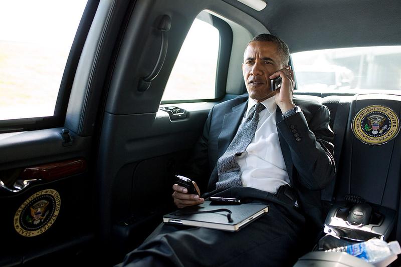 President Barack Obama talks on the phone with Aurora Mayor Steve Hogan the day of the movie theater shooting in Aurora, CO. July 20, 2012